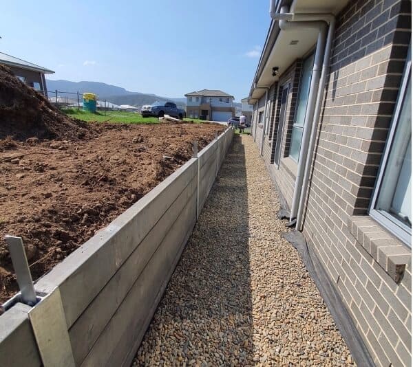 outdoor space retaining wall under construction