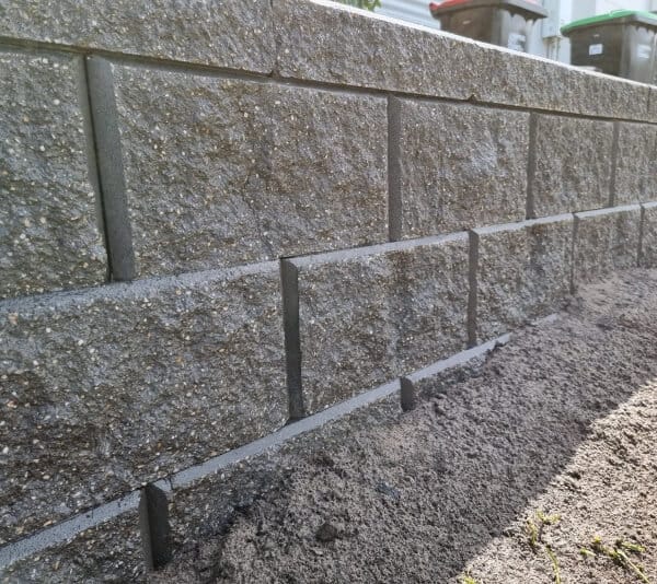 brick and stone retaining wall outdoors